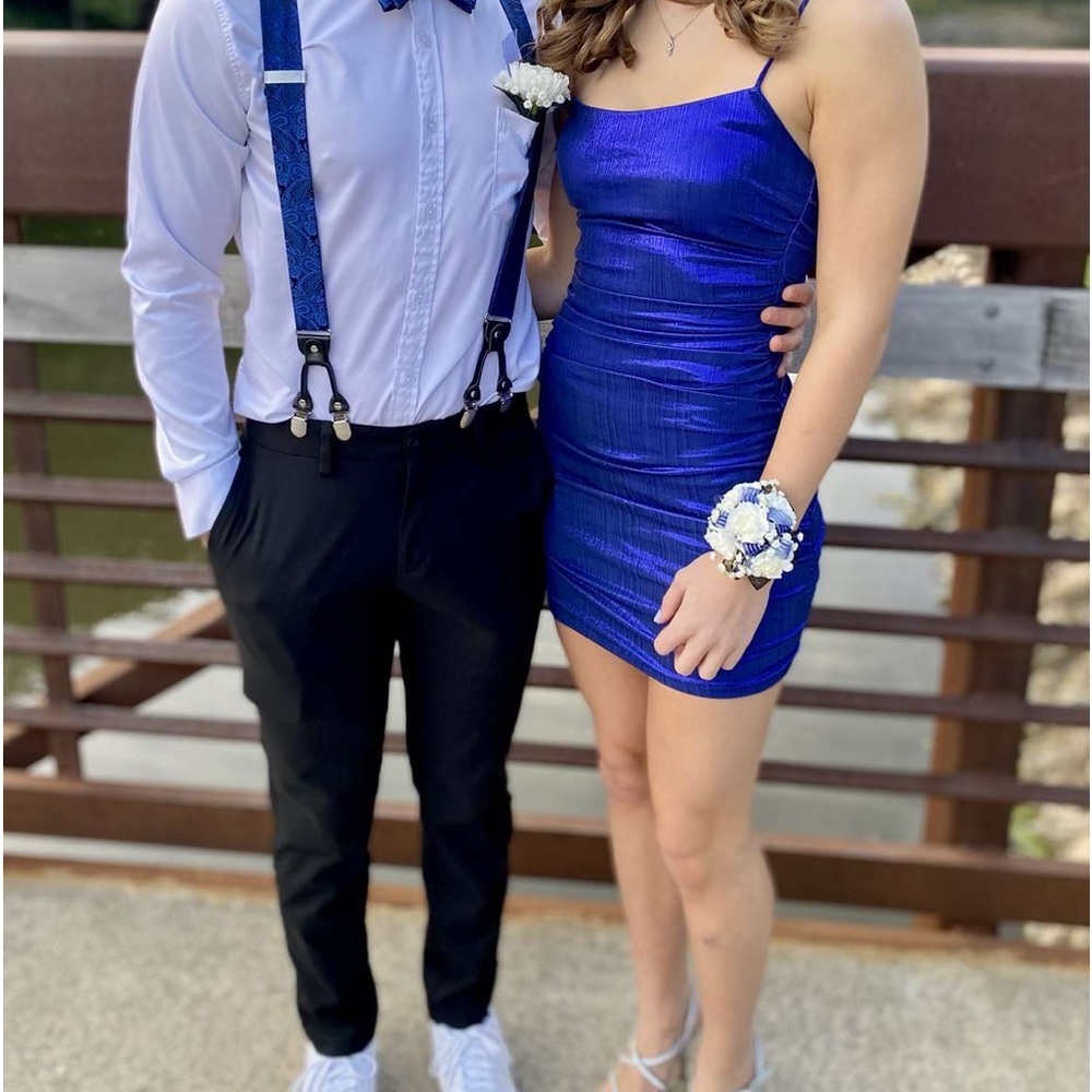 I’m selling a dark blue homecoming dress worn once.